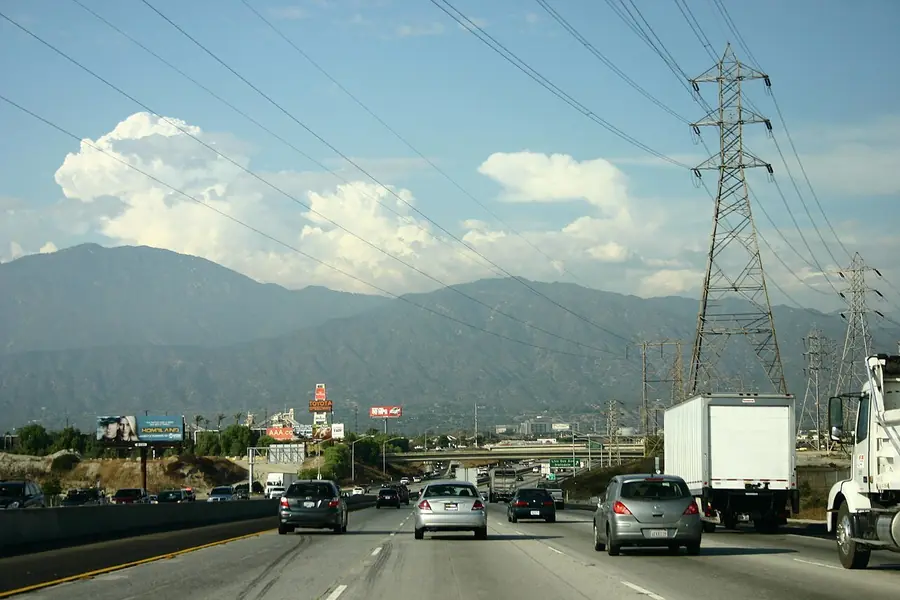 Freeway road and power lines below the mountains near Live Oak in Irwindale