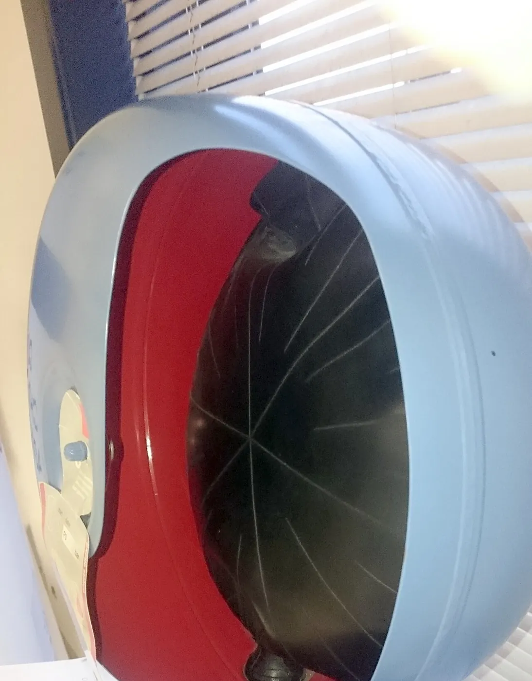 Cutaway expansion tank showing the rubber bladder inside