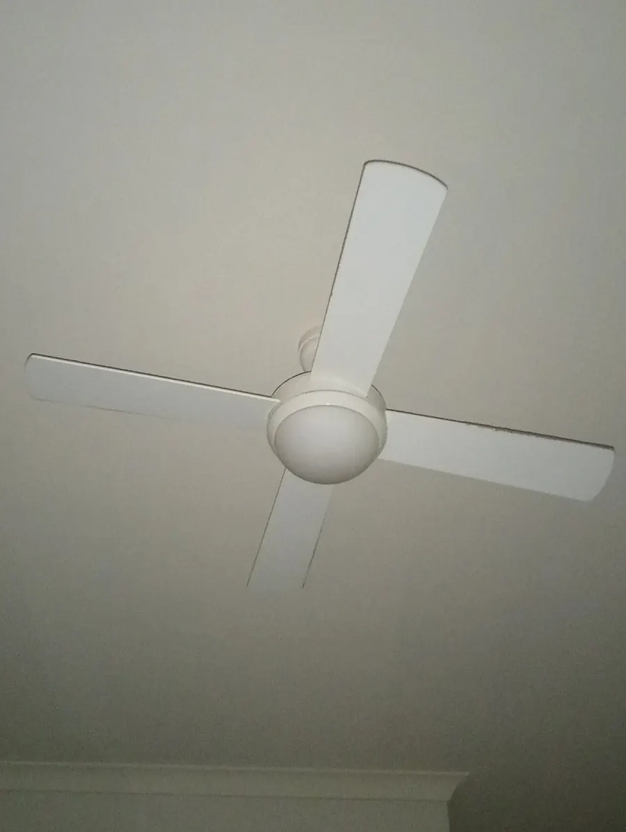 White four-blade ceiling fan with a dome light kit